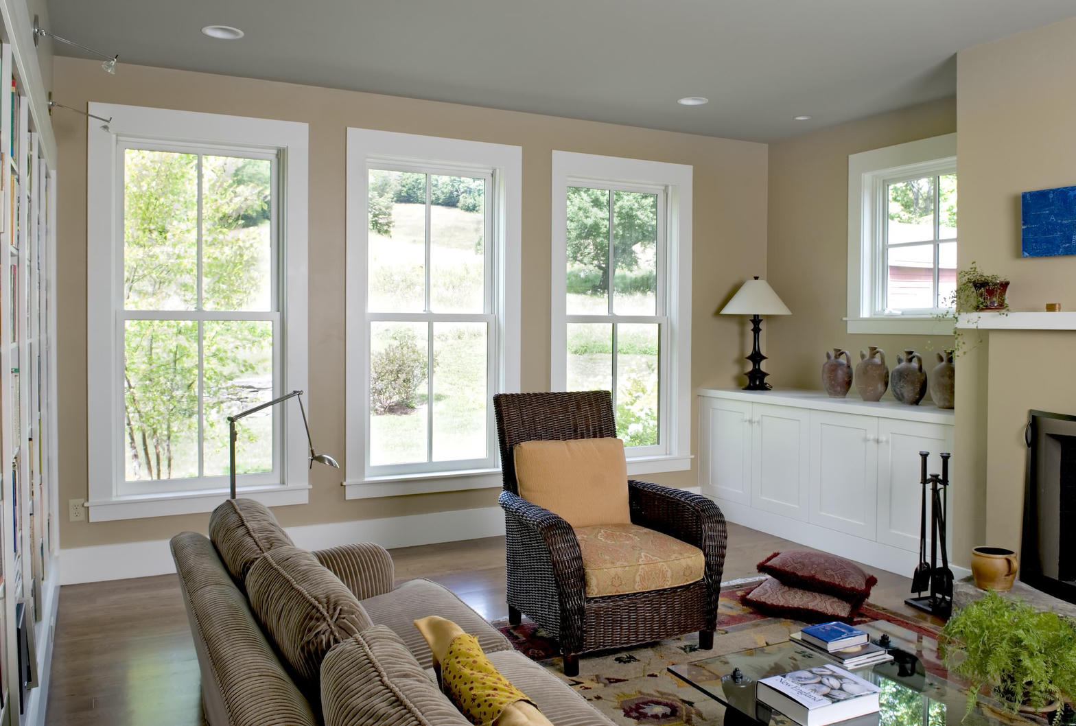 Living room with several bright vertical windows